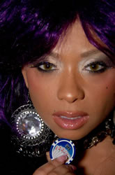 Model face closeup with big earring